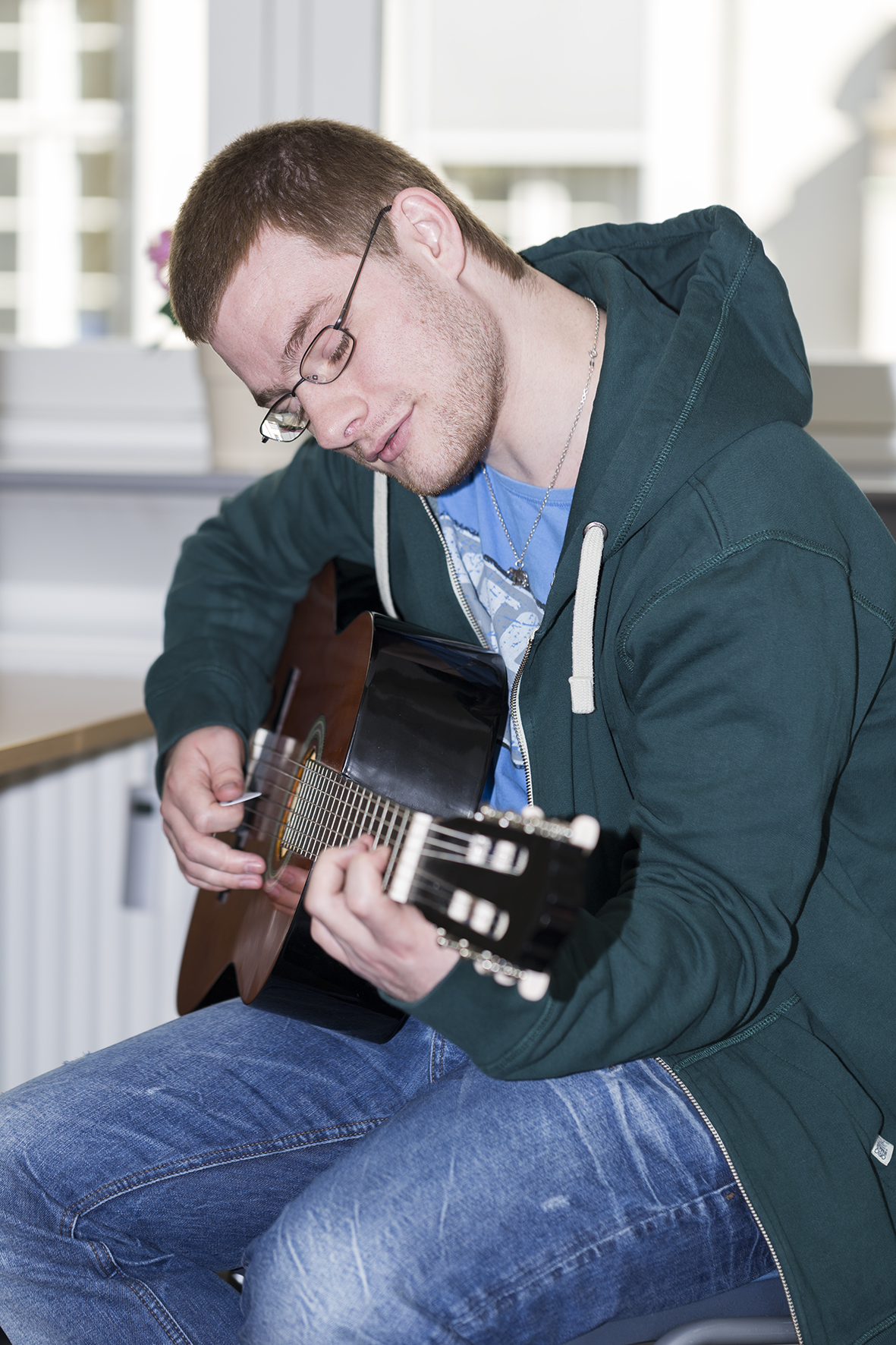 Foto af guitarspiller.